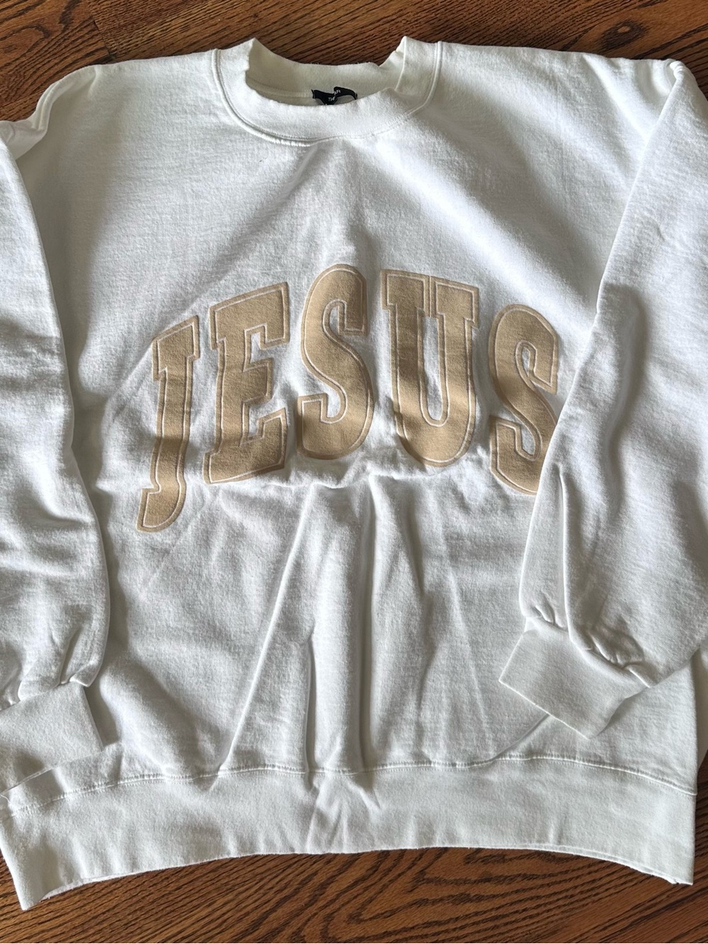 The Bar White Crewneck Sweatshirt with Beige 'JESUS' Lettering